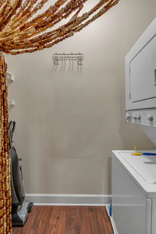 a view of a room with rack and wooden floor