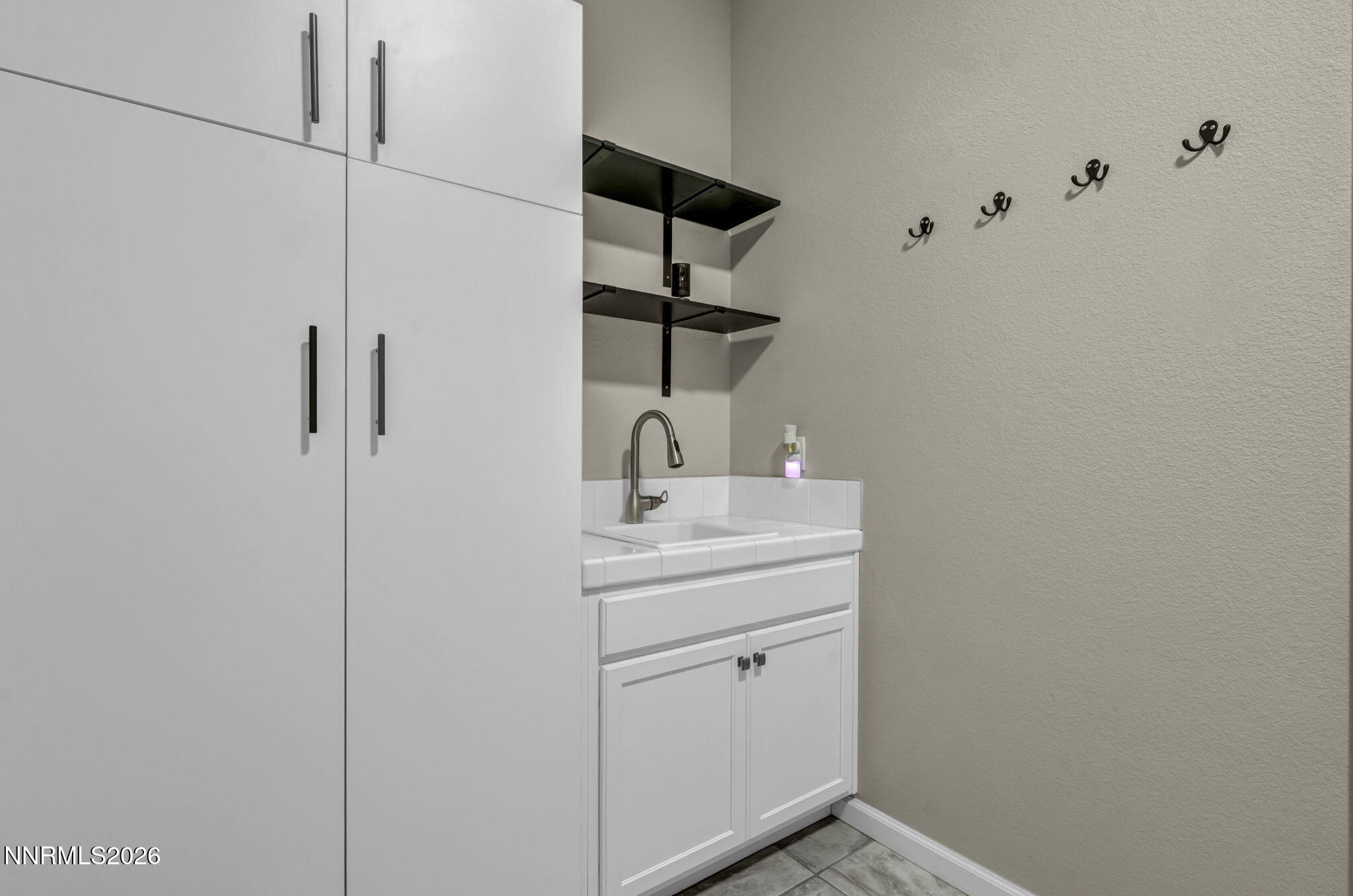 2029 Neviekay Lane Reno, NV 89521 - Photo 33 of 73 Laundry room cabinets