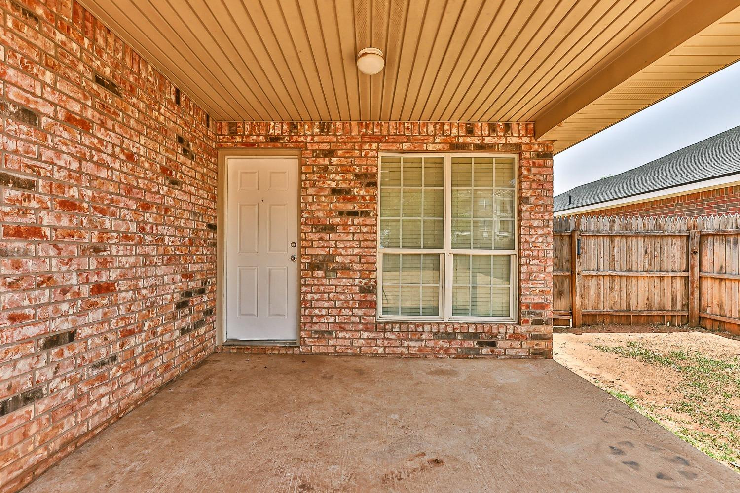 2006 100th Street Lubbock, TX 79423 - Photo 29 of 31 a view of front door with outdoor space