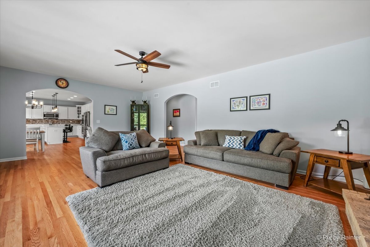 7104 Dove Way Cary, IL 60013 - Photo 14 of 82 a living room with furniture and a wooden floor