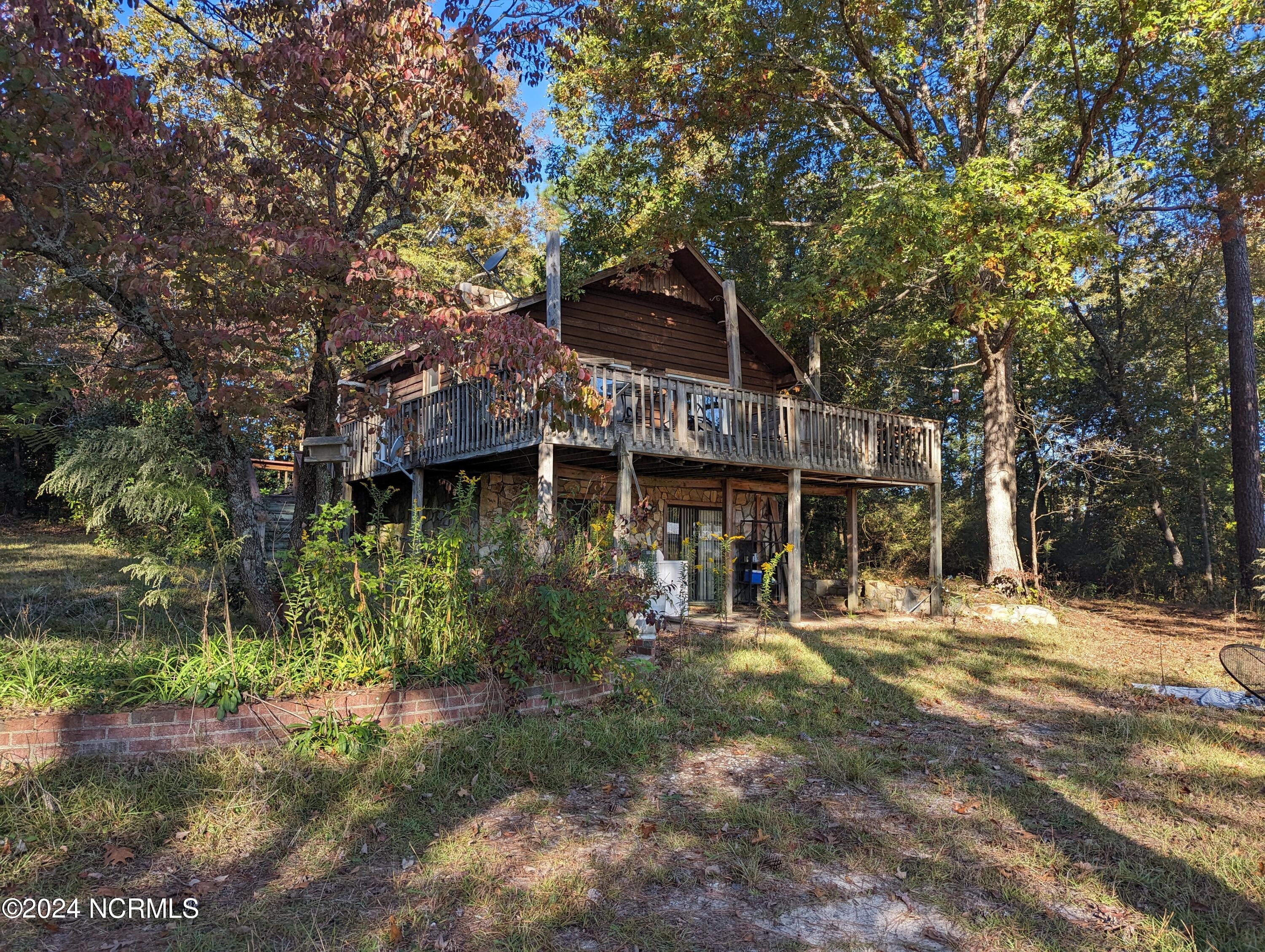 771 Atkins Road Cameron, NC 28326 - Photo 1 of 32 Chalet in the woods