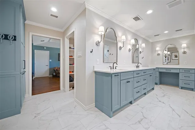 a spacious bathroom with a granite countertop sink mirror and shower