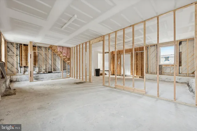 a large white building with a large window