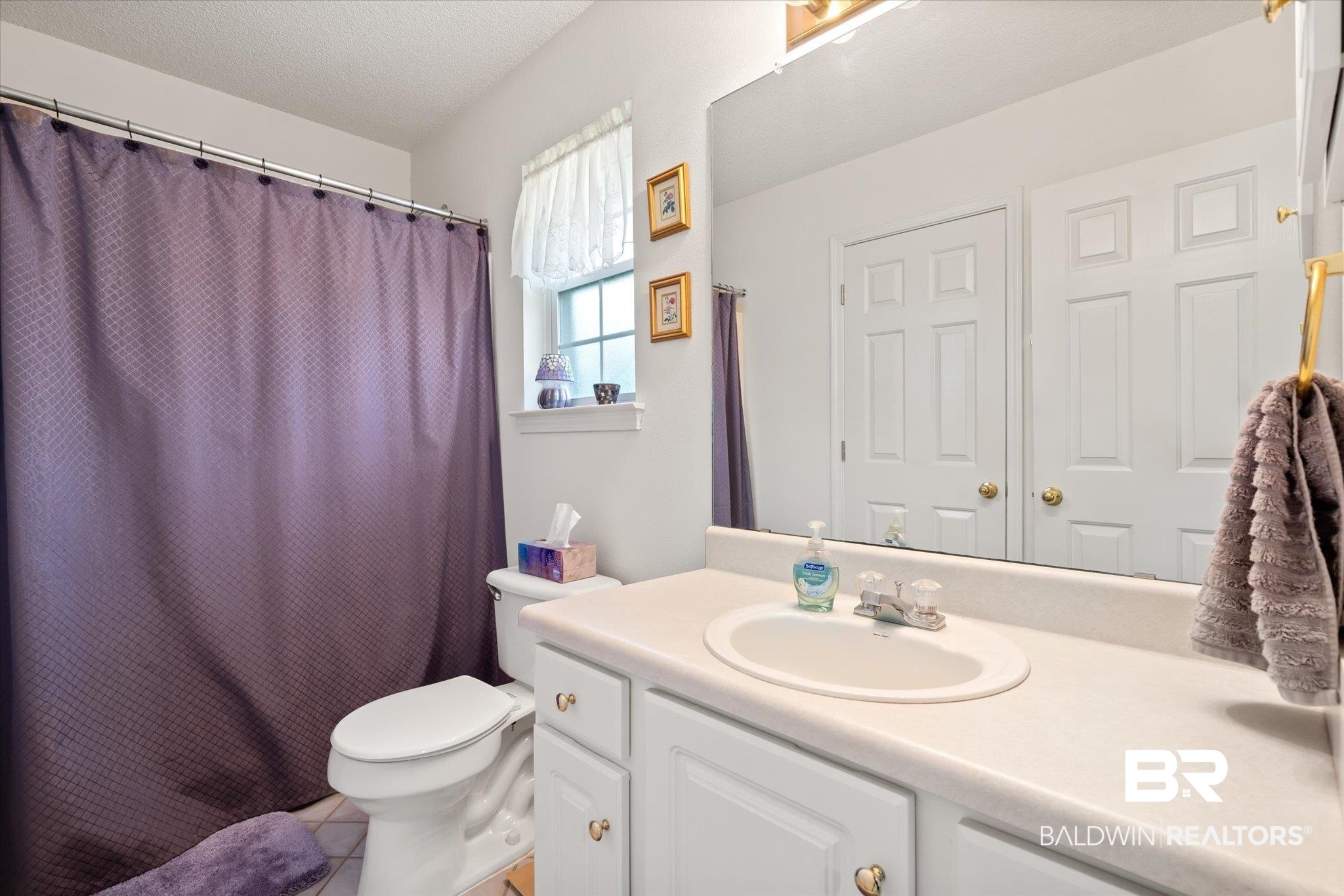 12520 Hunters Chase Foley, AL 36535 - Photo 29 of 32 Bathroom featuring vanity, toilet, a shower with curtain, and tile patterned flooring