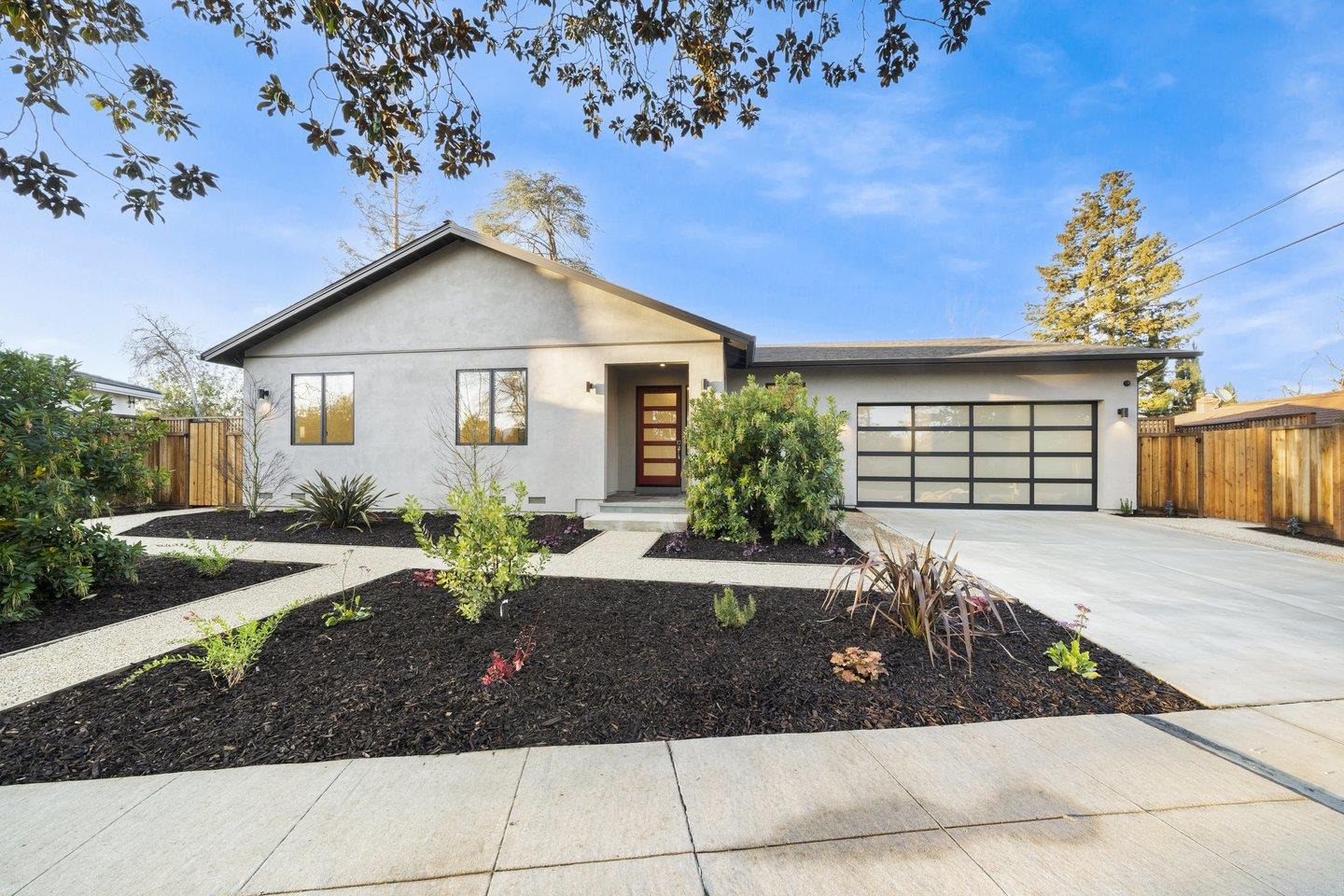 1009 Cascade Drive Sunnyvale, CA 94087 - Photo 2 of 89 a front view of a house with garden