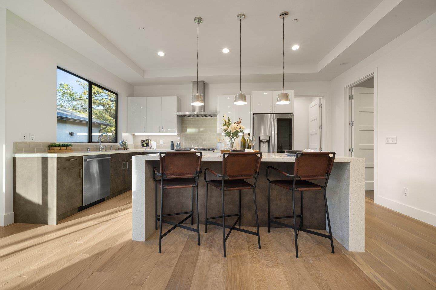 1009 Cascade Drive Sunnyvale, CA 94087 - Photo 23 of 89 a view of a dining room with furniture window and wooden floor
