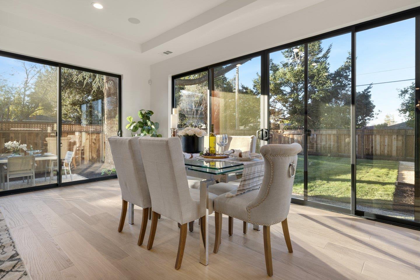 1009 Cascade Drive Sunnyvale, CA 94087 - Photo 25 of 89 a view of a dining room with furniture window and wooden floor