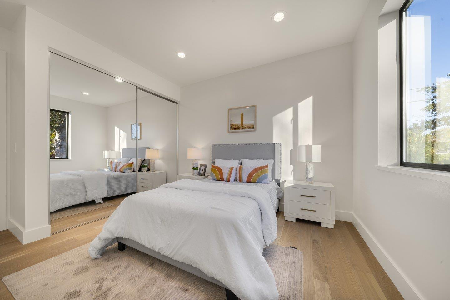 1009 Cascade Drive Sunnyvale, CA 94087 - Photo 28 of 89 a bedroom with a bed and a large window