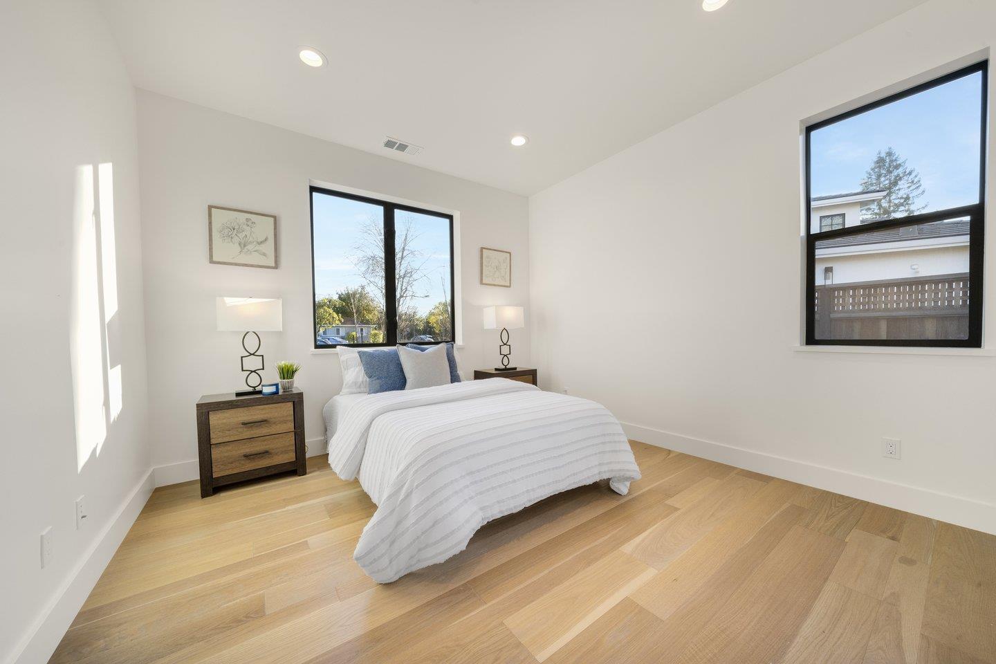 1009 Cascade Drive Sunnyvale, CA 94087 - Photo 30 of 89 a bedroom with a large bed and a window