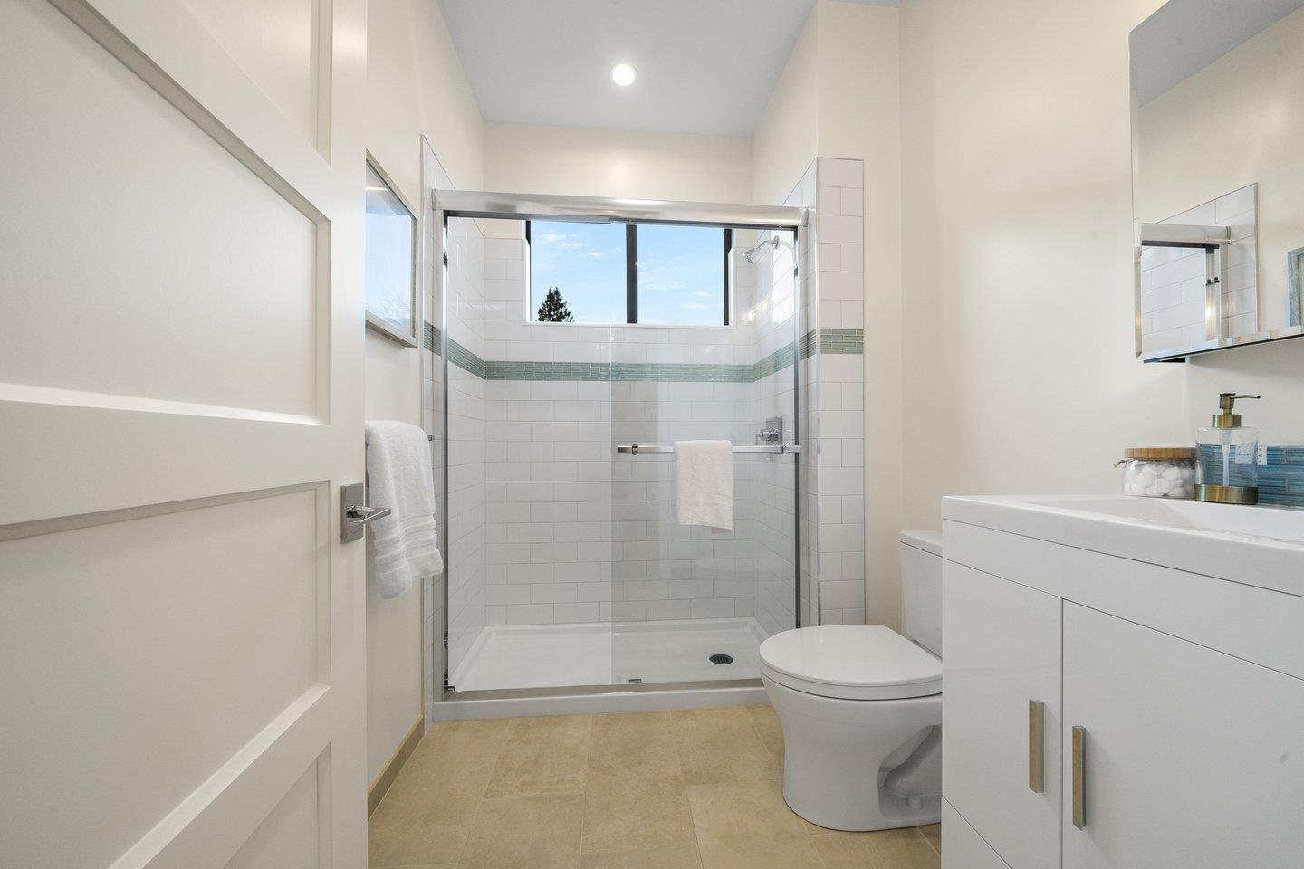 1009 Cascade Drive Sunnyvale, CA 94087 - Photo 34 of 89 a bathroom with a shower a toilet and sink