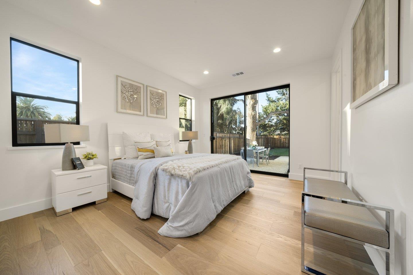 1009 Cascade Drive Sunnyvale, CA 94087 - Photo 35 of 89 a spacious bedroom with a bed and a couch