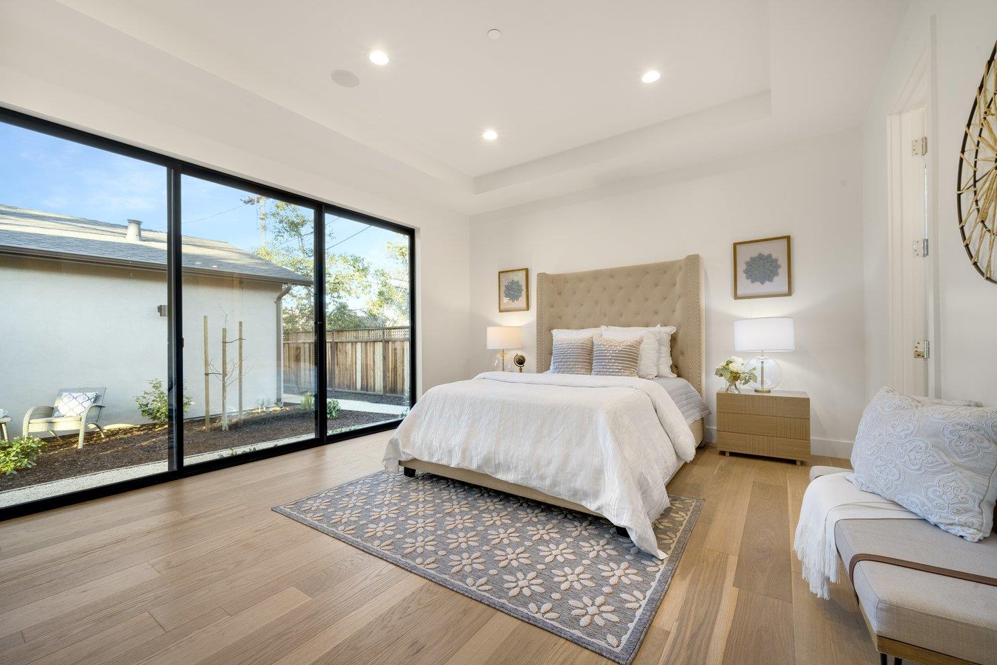 1009 Cascade Drive Sunnyvale, CA 94087 - Photo 41 of 89 a spacious bedroom with a large bed and a window