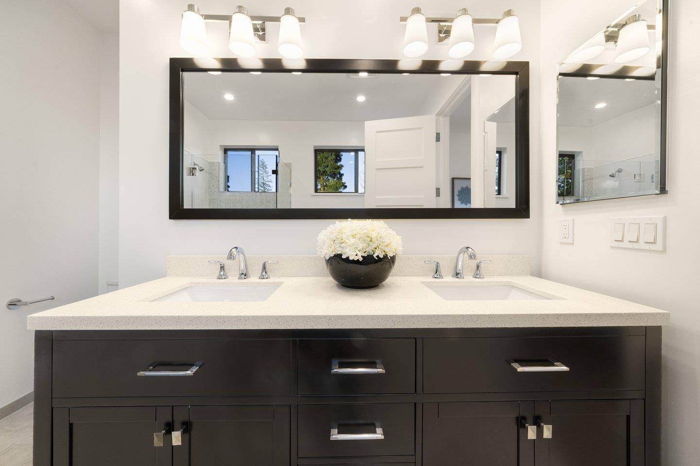 1009 Cascade Drive Sunnyvale, CA 94087 - Photo 45 of 89 a bathroom with a sink and a mirror