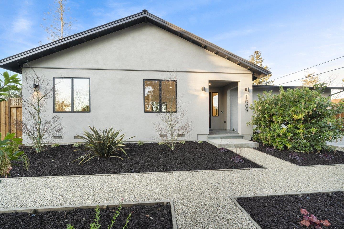 1009 Cascade Drive Sunnyvale, CA 94087 - Photo 5 of 89 a front view of a house with a yard