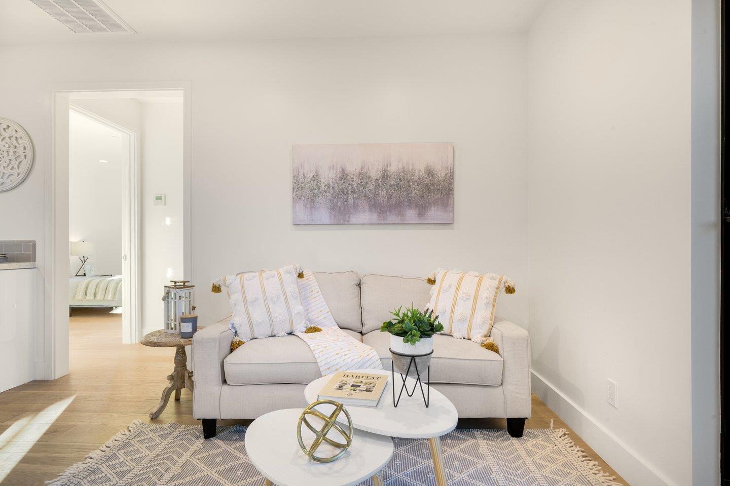 1009 Cascade Drive Sunnyvale, CA 94087 - Photo 54 of 89 a living room with furniture and a table