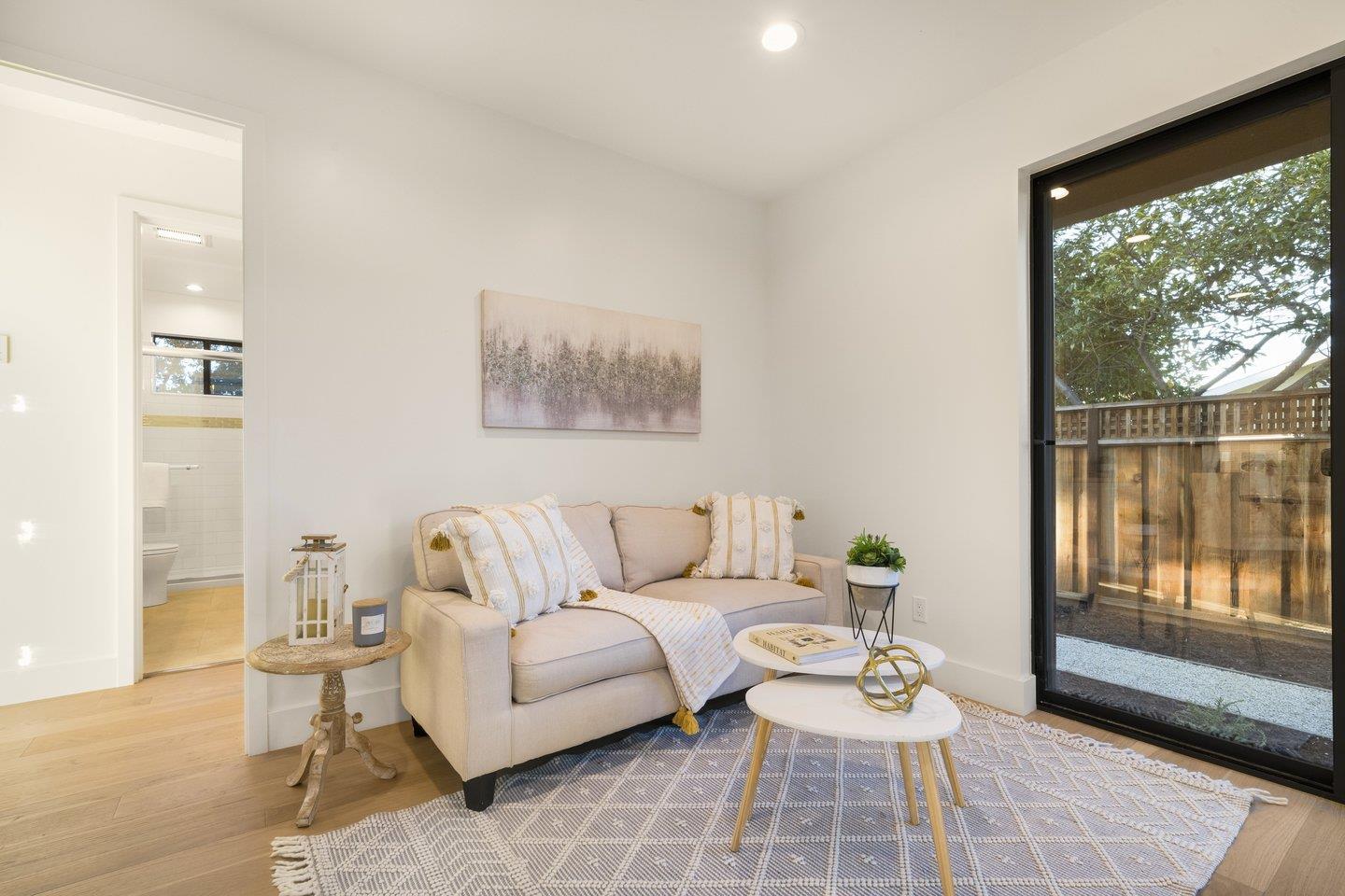 1009 Cascade Drive Sunnyvale, CA 94087 - Photo 55 of 89 a living room with furniture and a large window