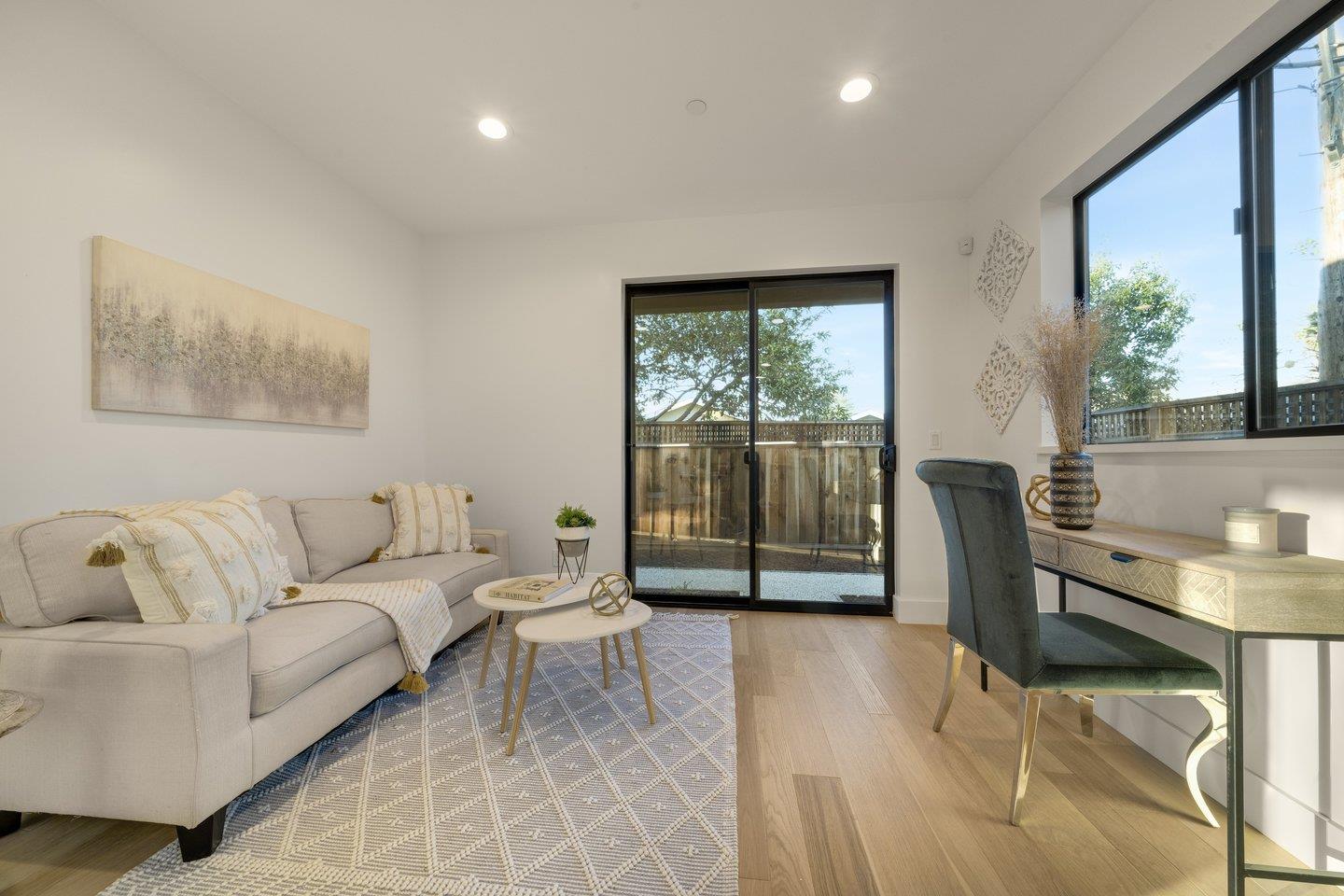 1009 Cascade Drive Sunnyvale, CA 94087 - Photo 56 of 89 a living room with furniture and a window