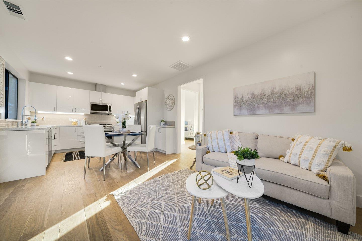 1009 Cascade Drive Sunnyvale, CA 94087 - Photo 57 of 89 a living room with furniture kitchen view and a table
