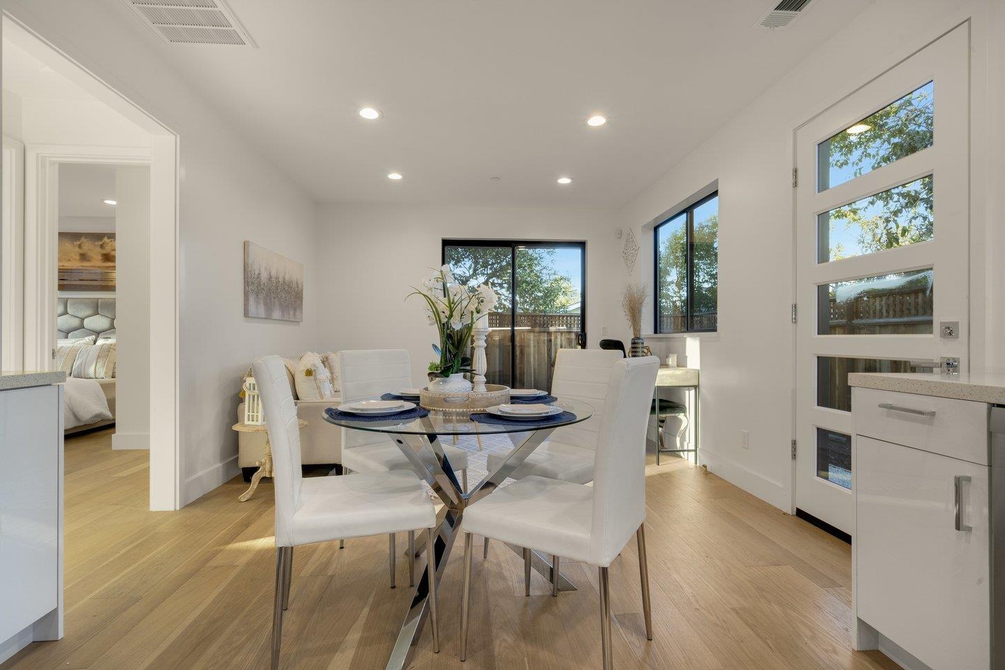 1009 Cascade Drive Sunnyvale, CA 94087 - Photo 58 of 89 a view of a dining room with furniture and wooden floor
