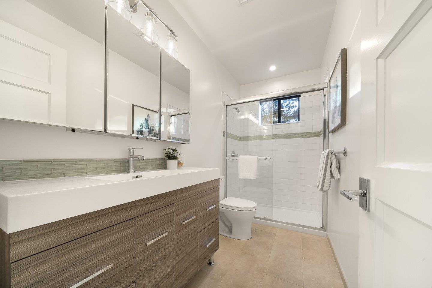 1009 Cascade Drive Sunnyvale, CA 94087 - Photo 70 of 89 a bathroom with a sink a toilet and shower