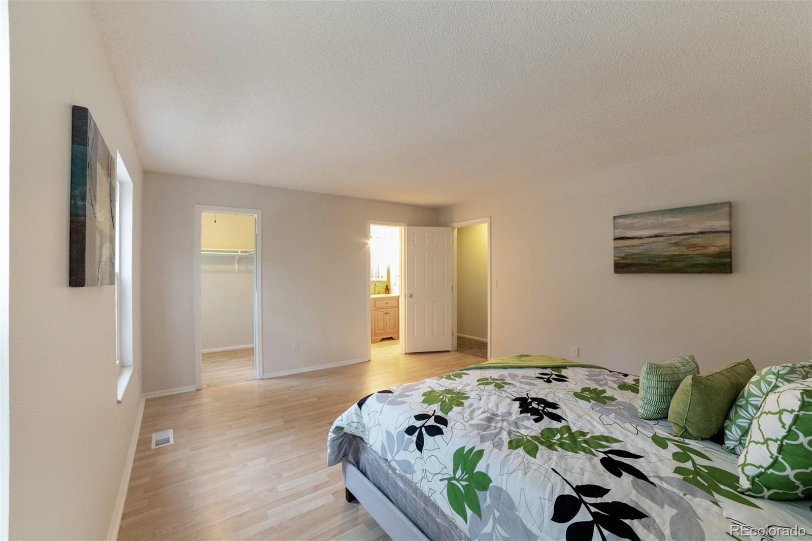 9575 Carr Street Westminster, CO 80021 - Photo 11 of 25 a bedroom with bed and window