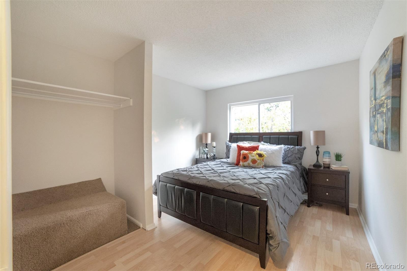9575 Carr Street Westminster, CO 80021 - Photo 12 of 25 a bedroom with a bed and a window