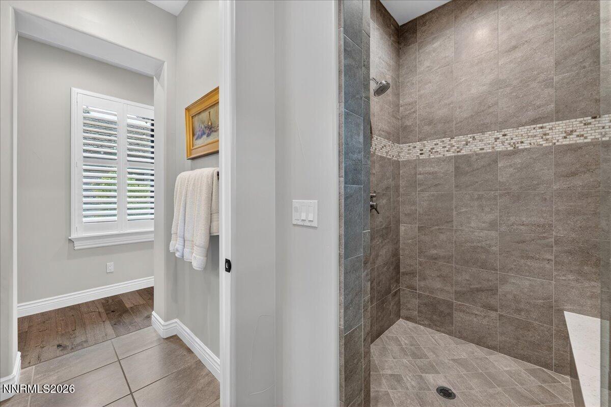 5096 Bordeaux Court Reno, NV 89511 - Photo 50 of 70 a bathroom with a bathtub and shower