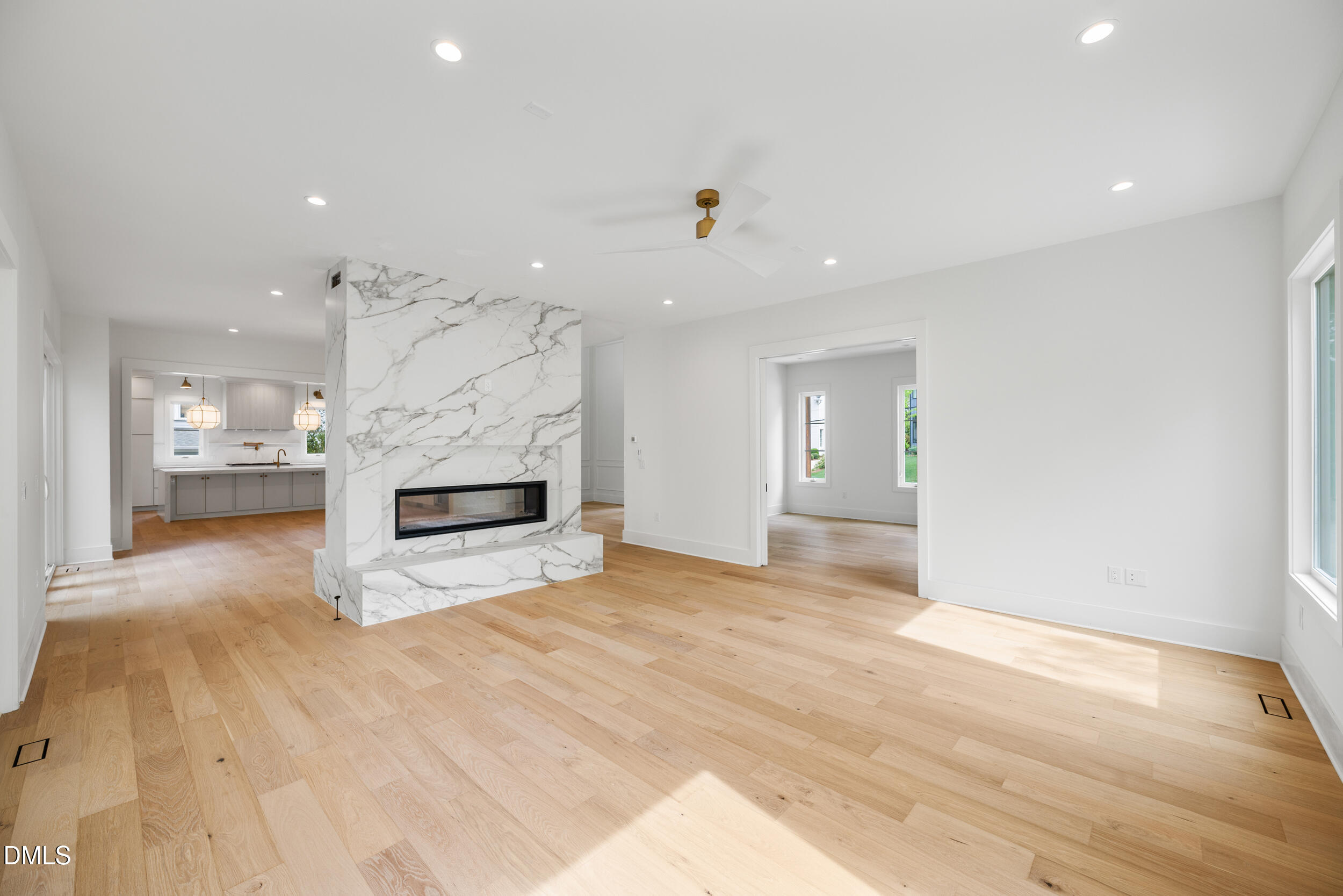 2817 Claremont Road Raleigh, NC 27608 - Photo 14 of 73 a view of an empty room and a kitchen