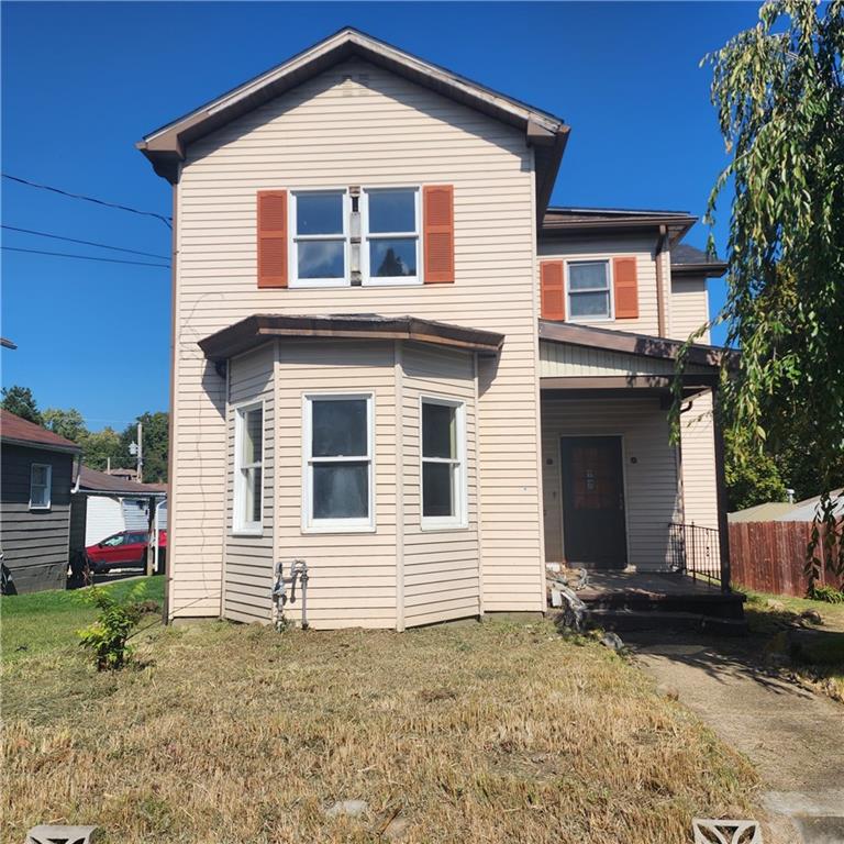 524 Cross Street Rochester, PA 15074 - Photo 1 of 20 a view of a house with a yard