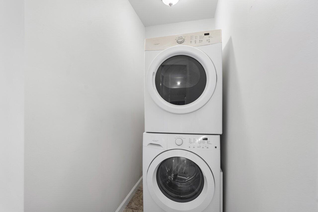 6684 Via Regina Boca Raton, FL 33433 - Photo 9 of 19 a close up view of a washer and dryer