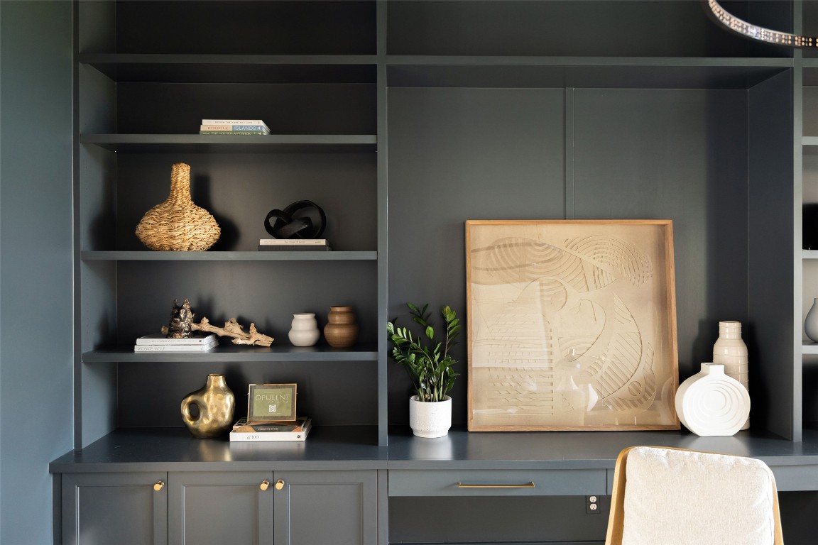 567 Delayne Drive Austin, TX 78737 - Photo 22 of 40 a room with a wooden floor and shelf