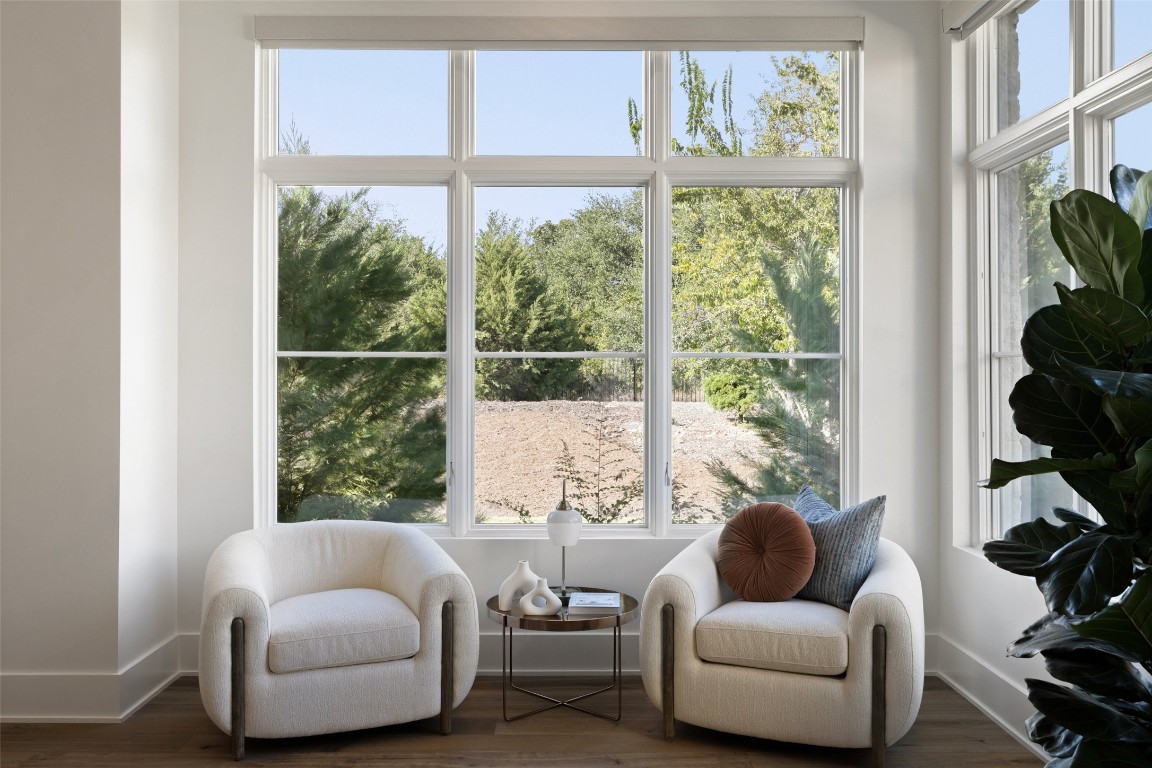567 Delayne Drive Austin, TX 78737 - Photo 28 of 40 a living room with furniture and floor to ceiling windows