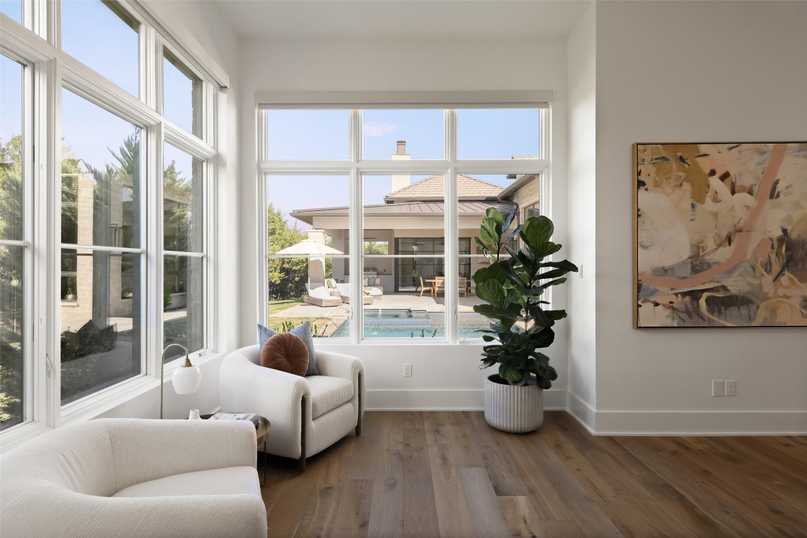 567 Delayne Drive Austin, TX 78737 - Photo 29 of 40 a living room with furniture and a potted plant