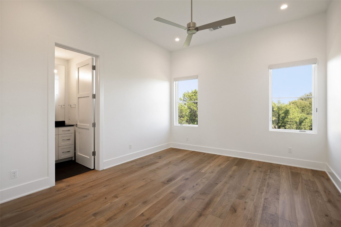 567 Delayne Drive Austin, TX 78737 - Photo 33 of 40 an empty room with windows and closet