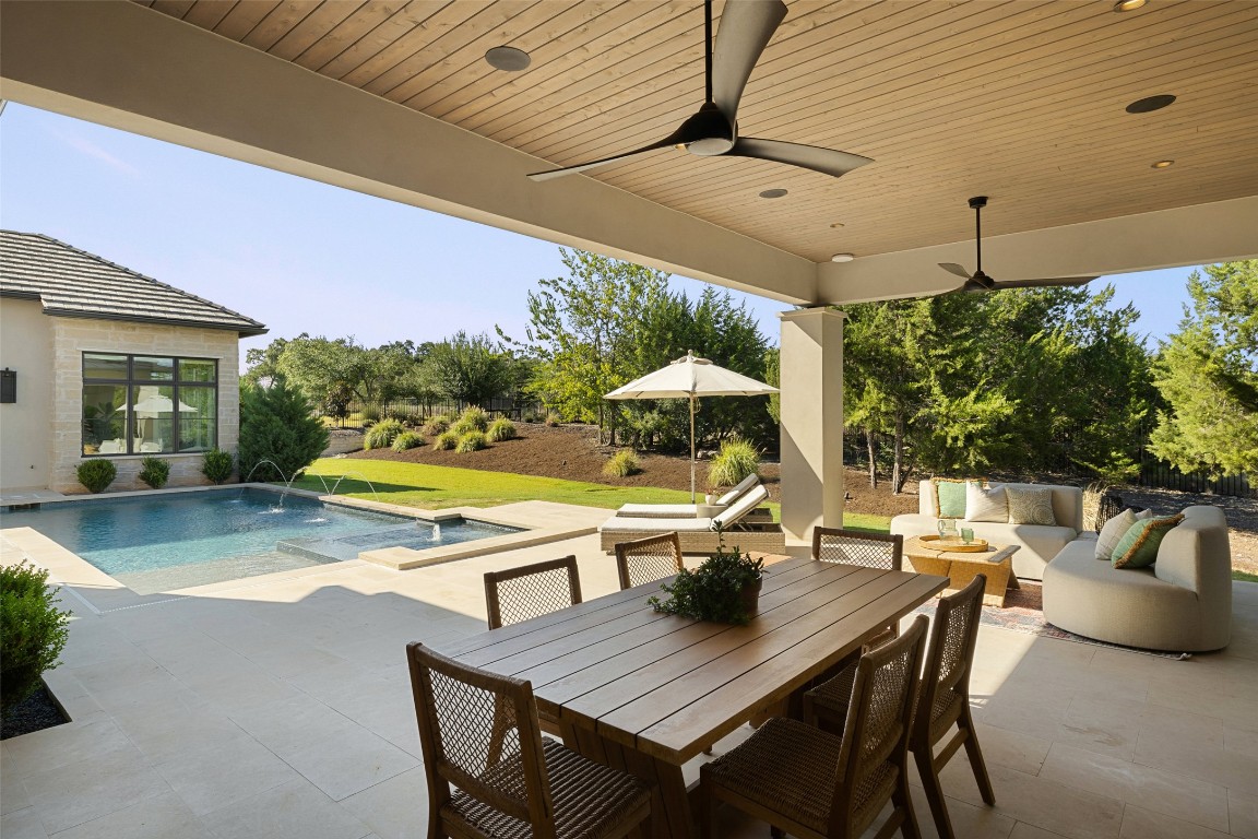 567 Delayne Drive Austin, TX 78737 - Photo 37 of 40 a view of swimming pool with outdoor seating and plants