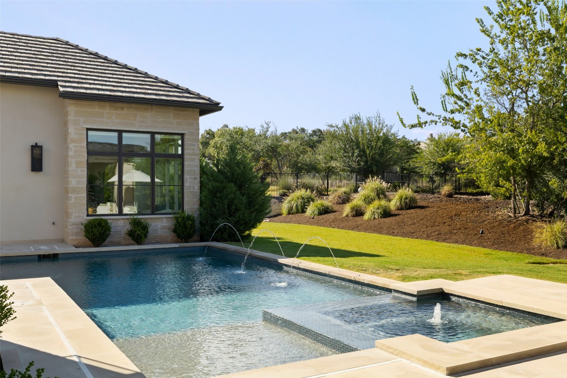 567 Delayne Drive Austin, TX 78737 - Photo 38 of 40 a view of swimming pool with seating space