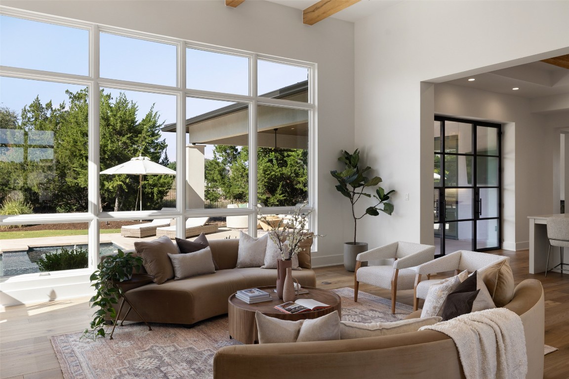 567 Delayne Drive Austin, TX 78737 - Photo 5 of 40 a living room with furniture and a large window