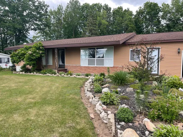 $297,000 | 1807 South Lake Mitchell Drive, Cadillac, MI 49601
