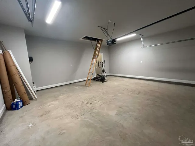 an empty room with gym equipment