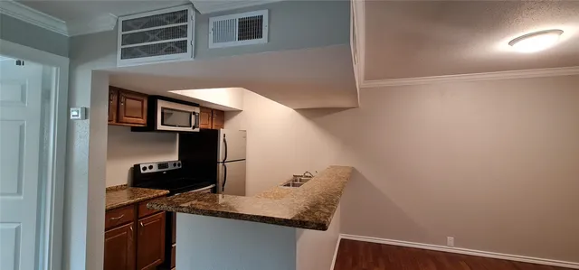 a view of storage and utility room