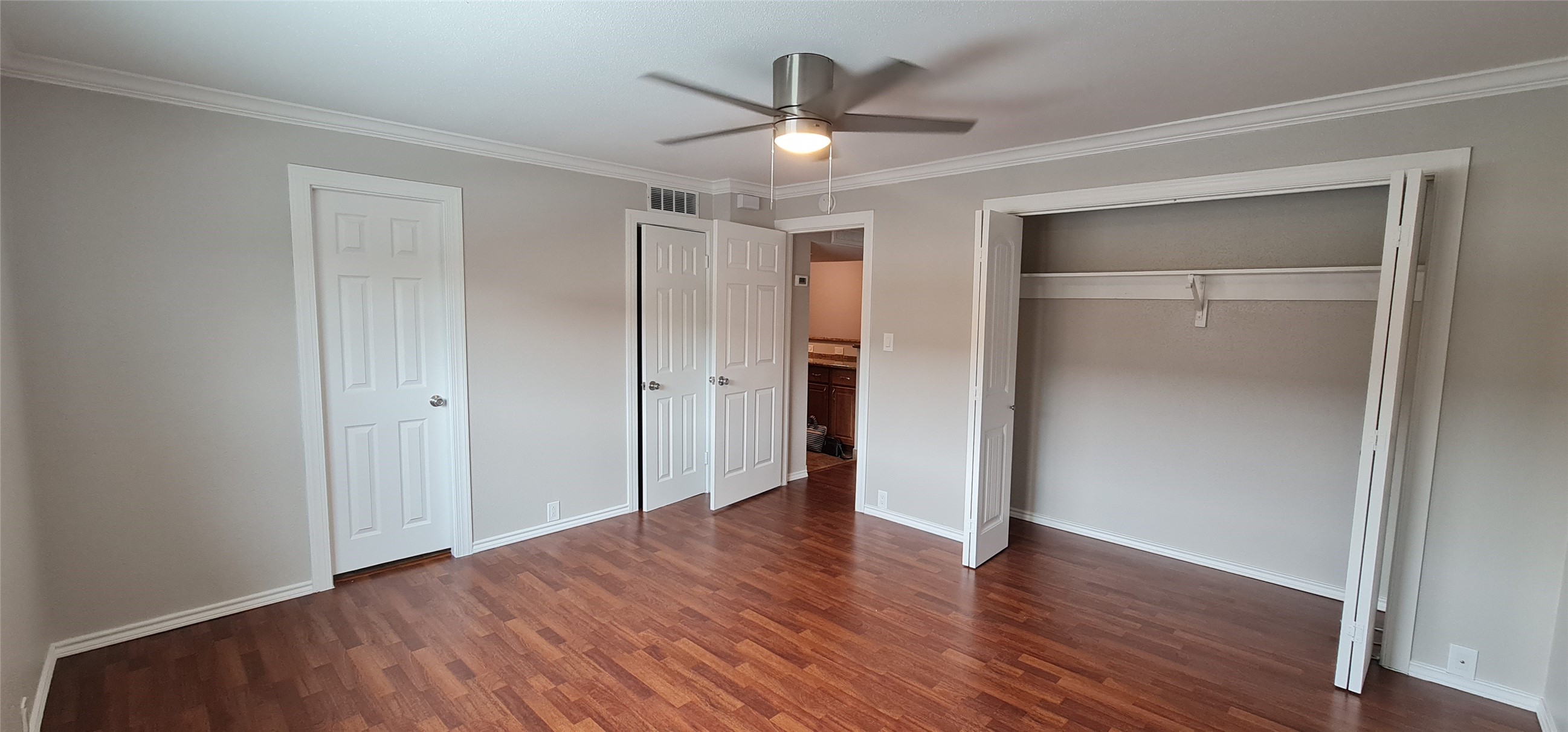 2201 Fountain View Drive, Unit 24 Houston, TX 77057 - Photo 3 of 9 a view of an empty room with wooden floor