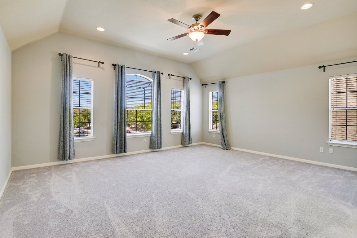 11705 Gold Run Cove Manor, TX 78653 - Photo 16 of 20 a view of an empty room with a window