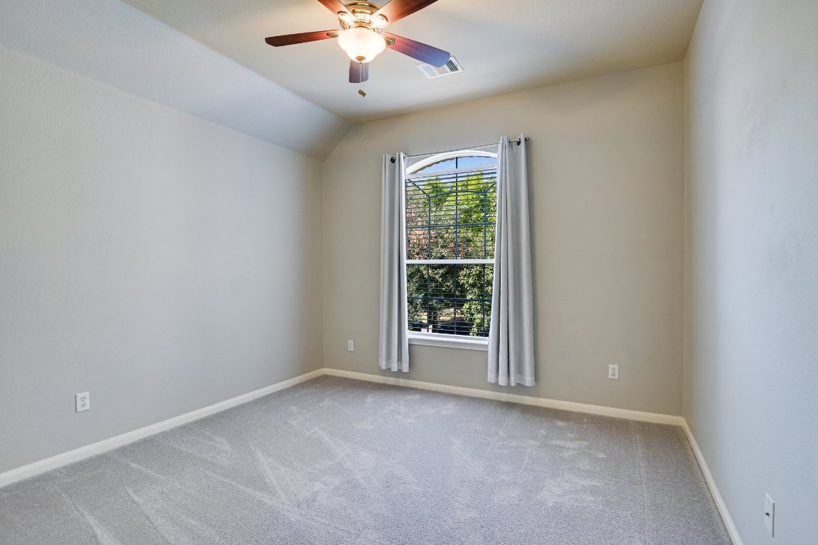 11705 Gold Run Cove Manor, TX 78653 - Photo 18 of 20 an empty room with a window
