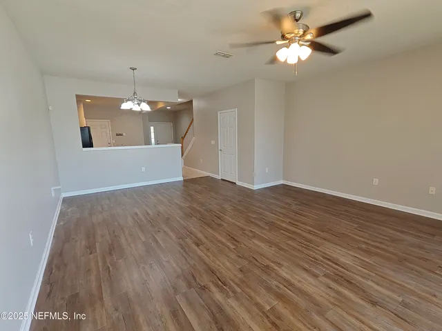 a view of porch with furniture and a yard
