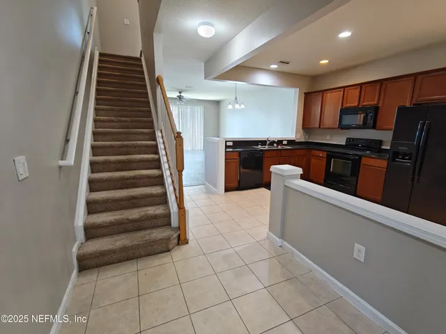 a bathroom with a sink a mirror and shower
