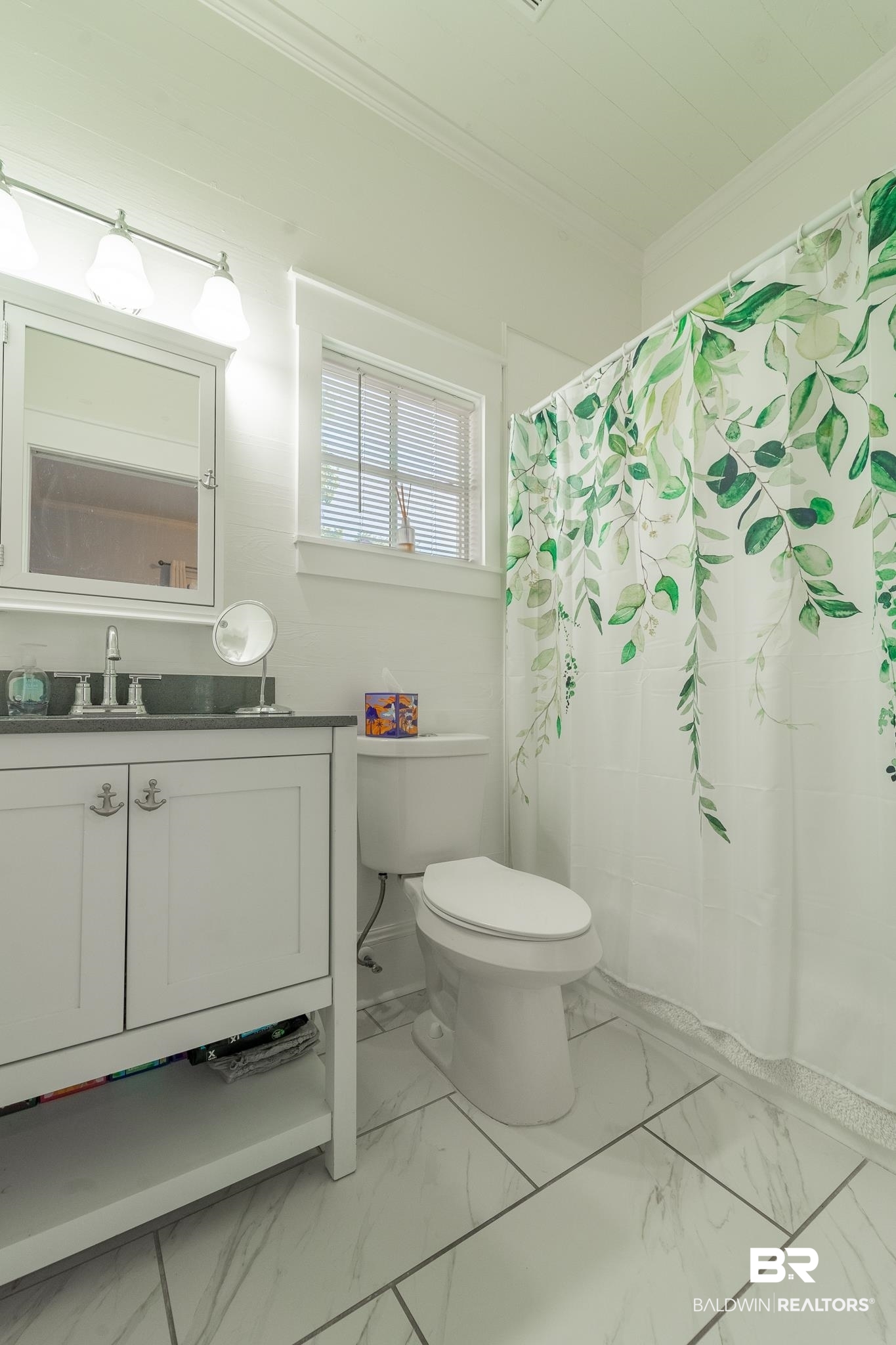 950 Texas Street Mobile, AL 36604 - Photo 12 of 17 Bathroom featuring crown molding, toilet, tile patterned floors, and vanity