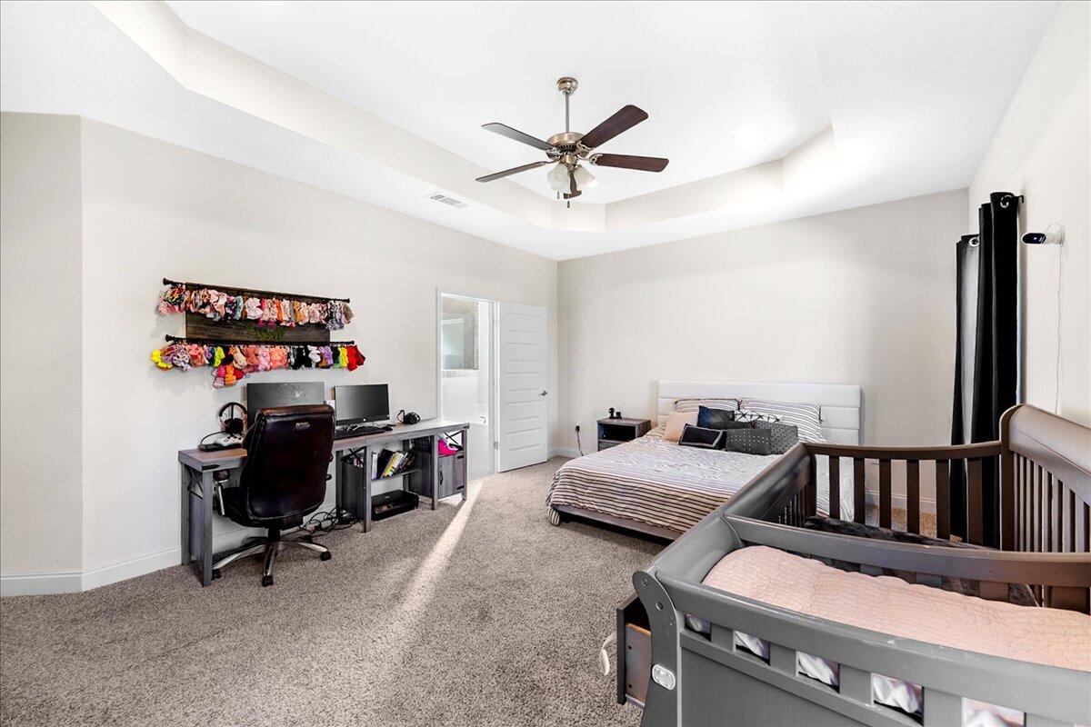 3030 Crown Creek Circle Crestview, FL 32539 - Photo 15 of 35 a bedroom with furniture and a window