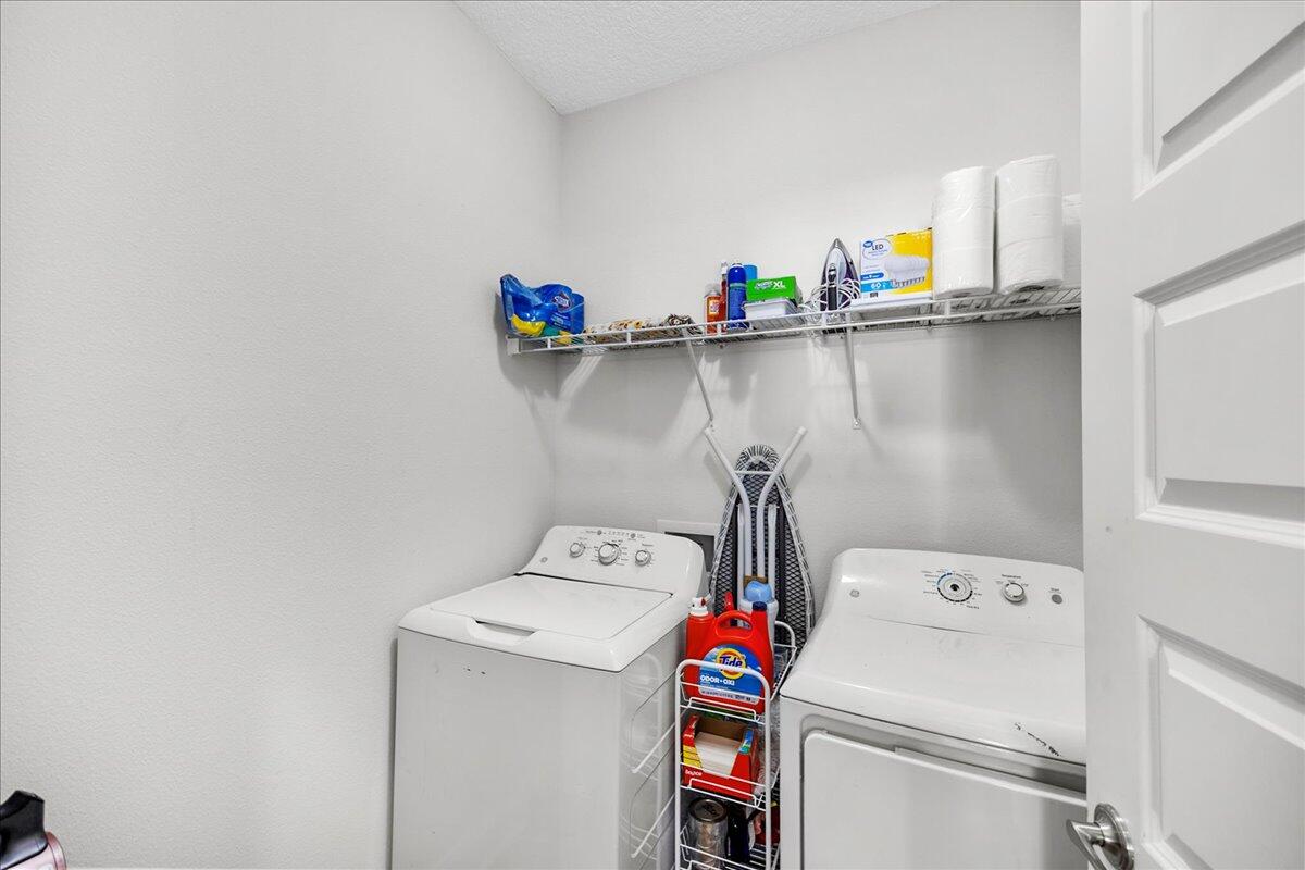 3030 Crown Creek Circle Crestview, FL 32539 - Photo 22 of 35 a utility room with dryer and washer