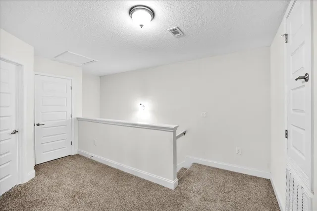 an empty room with an entryway