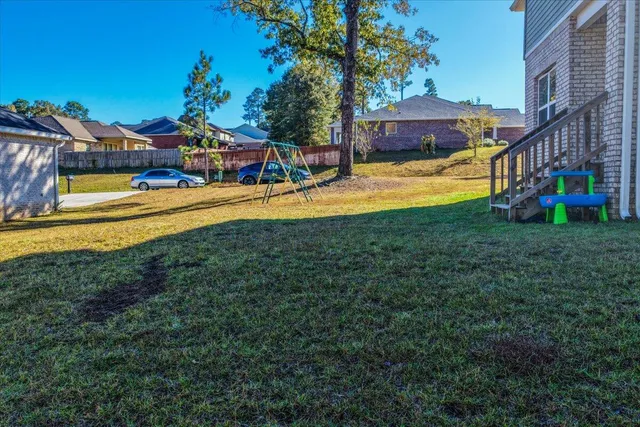 a view of a house with swimming pool